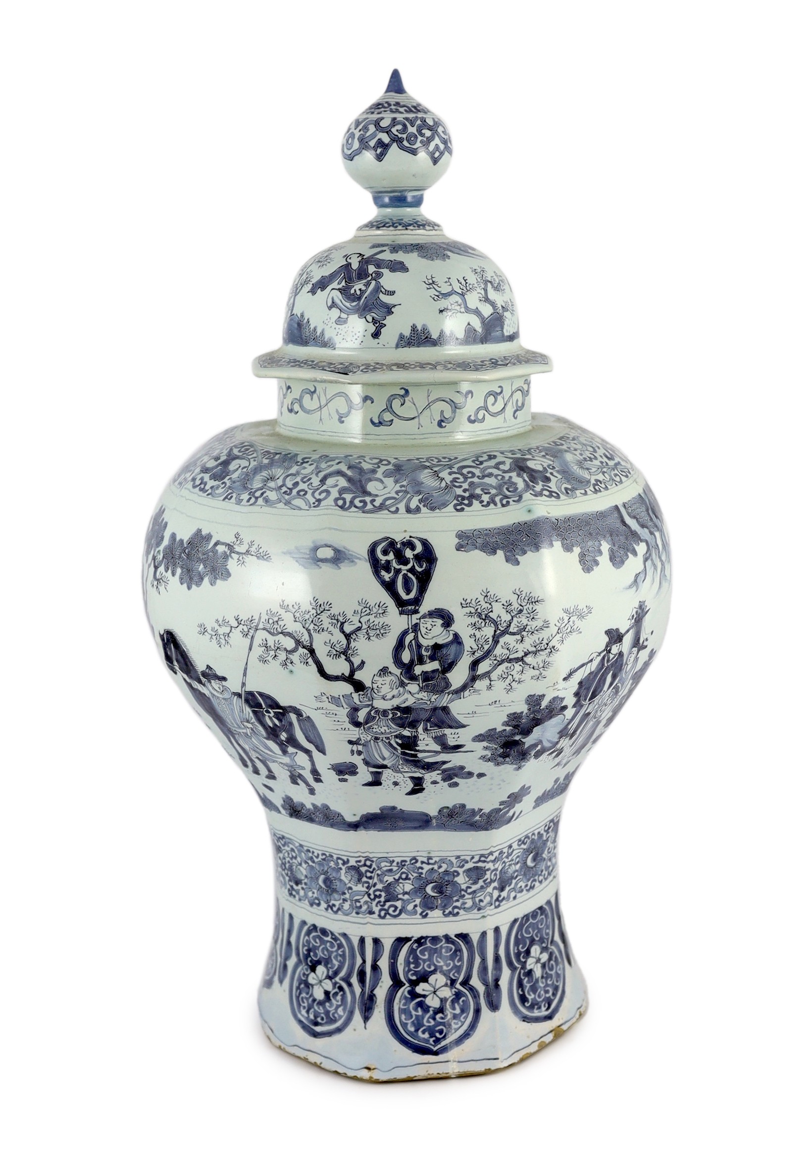 A massive Delft blue and white inverted baluster vase and cover, c.1700, 57.5cm high, neck and cover restored